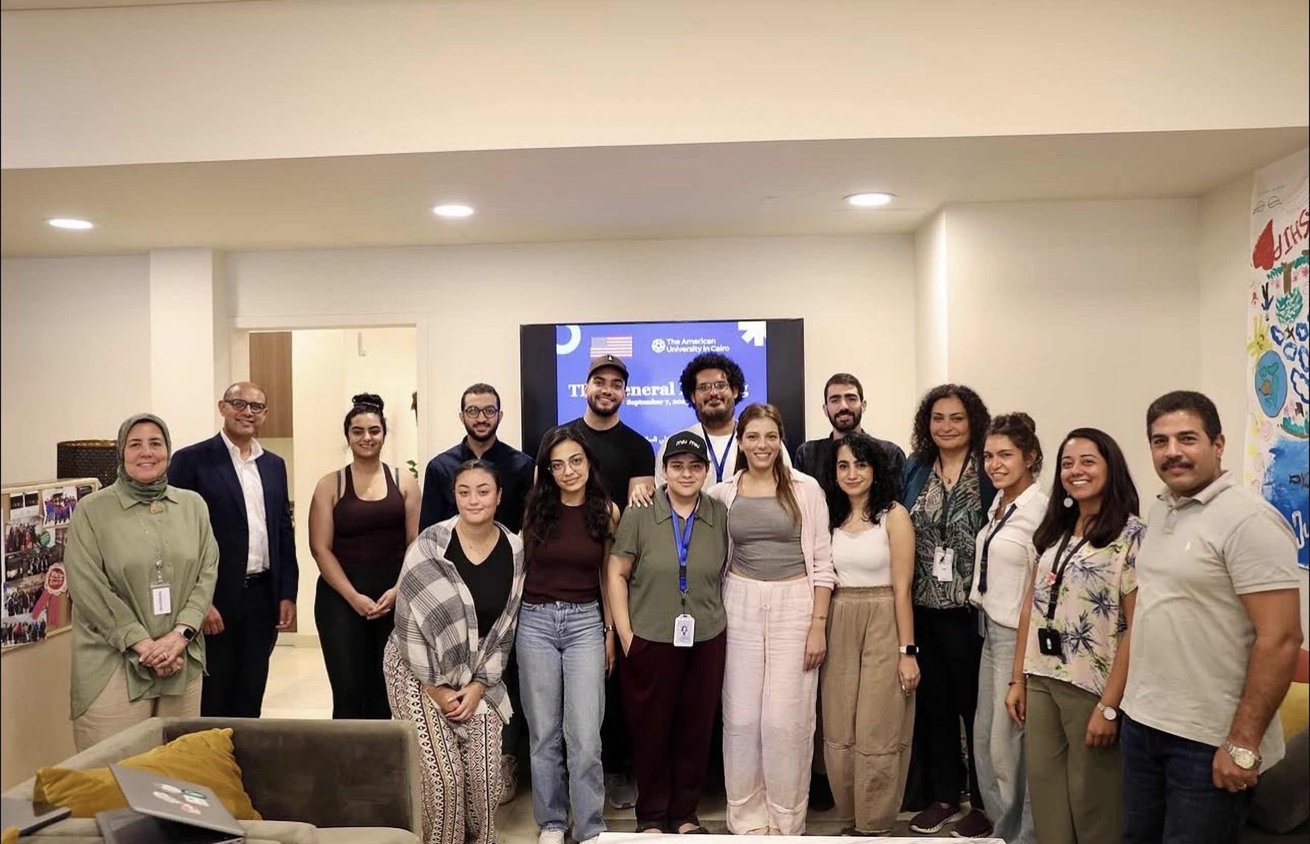 Graduate scholars and staff at a program meeting