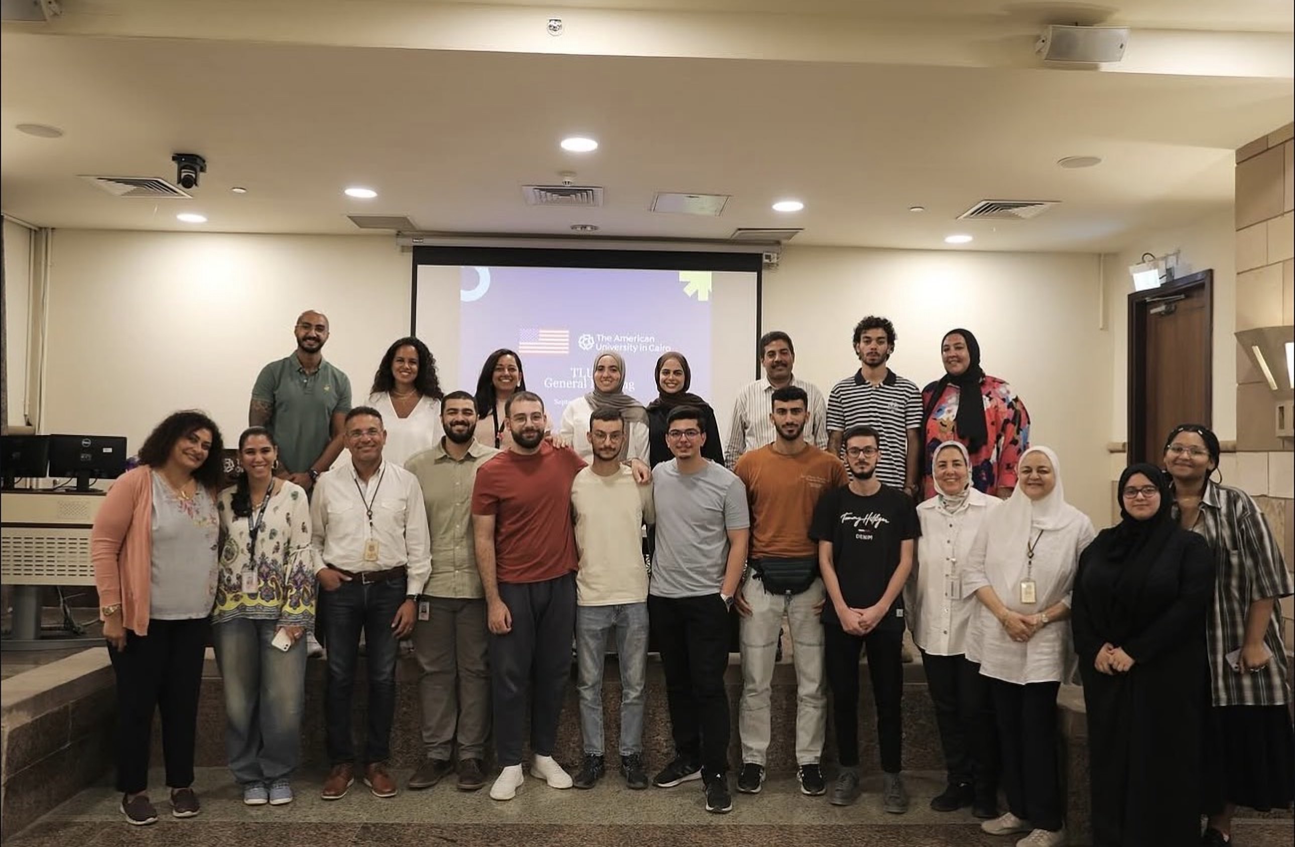 Scholars and staff at a general meeting
