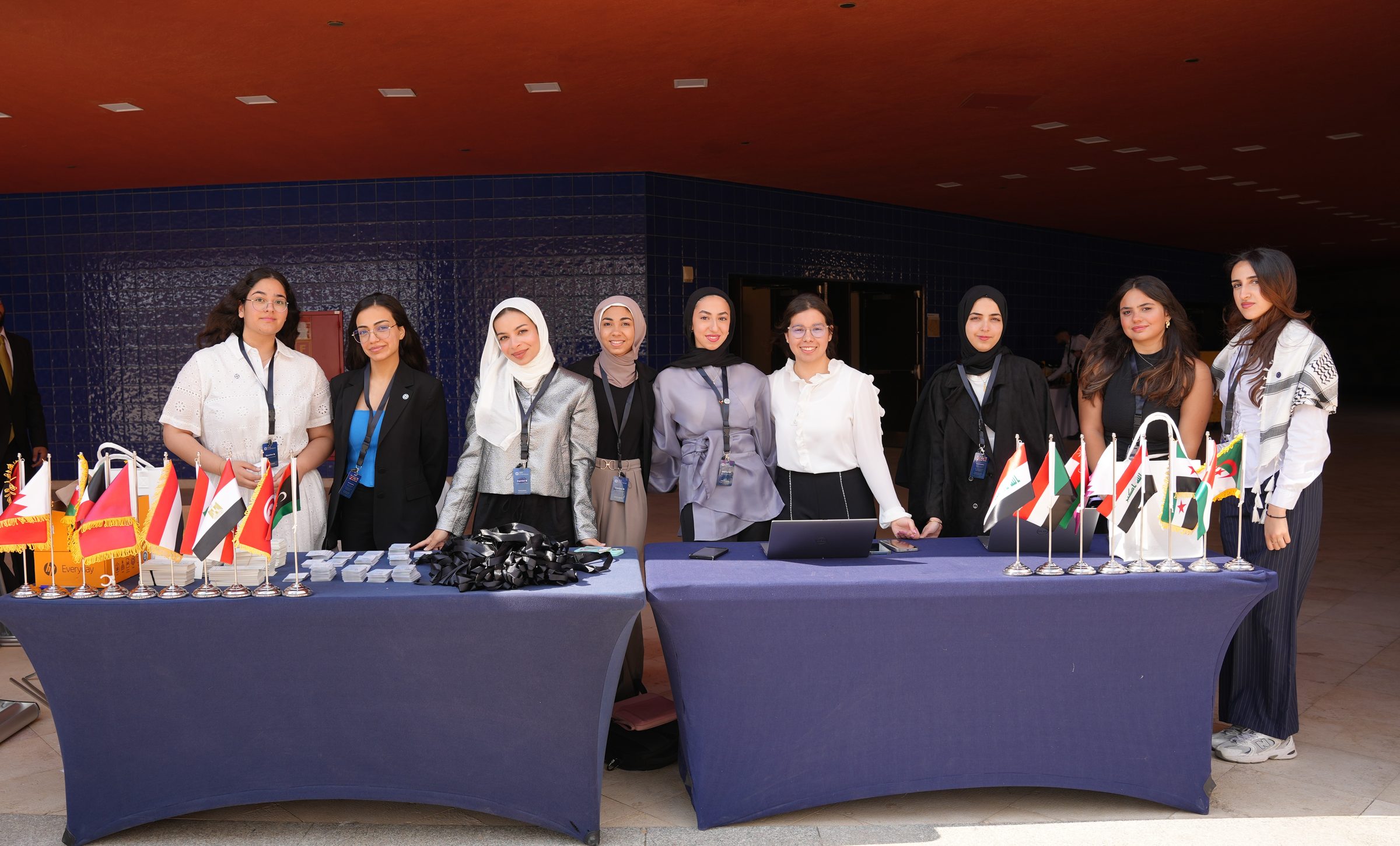 The student organizing team behind the registration desks