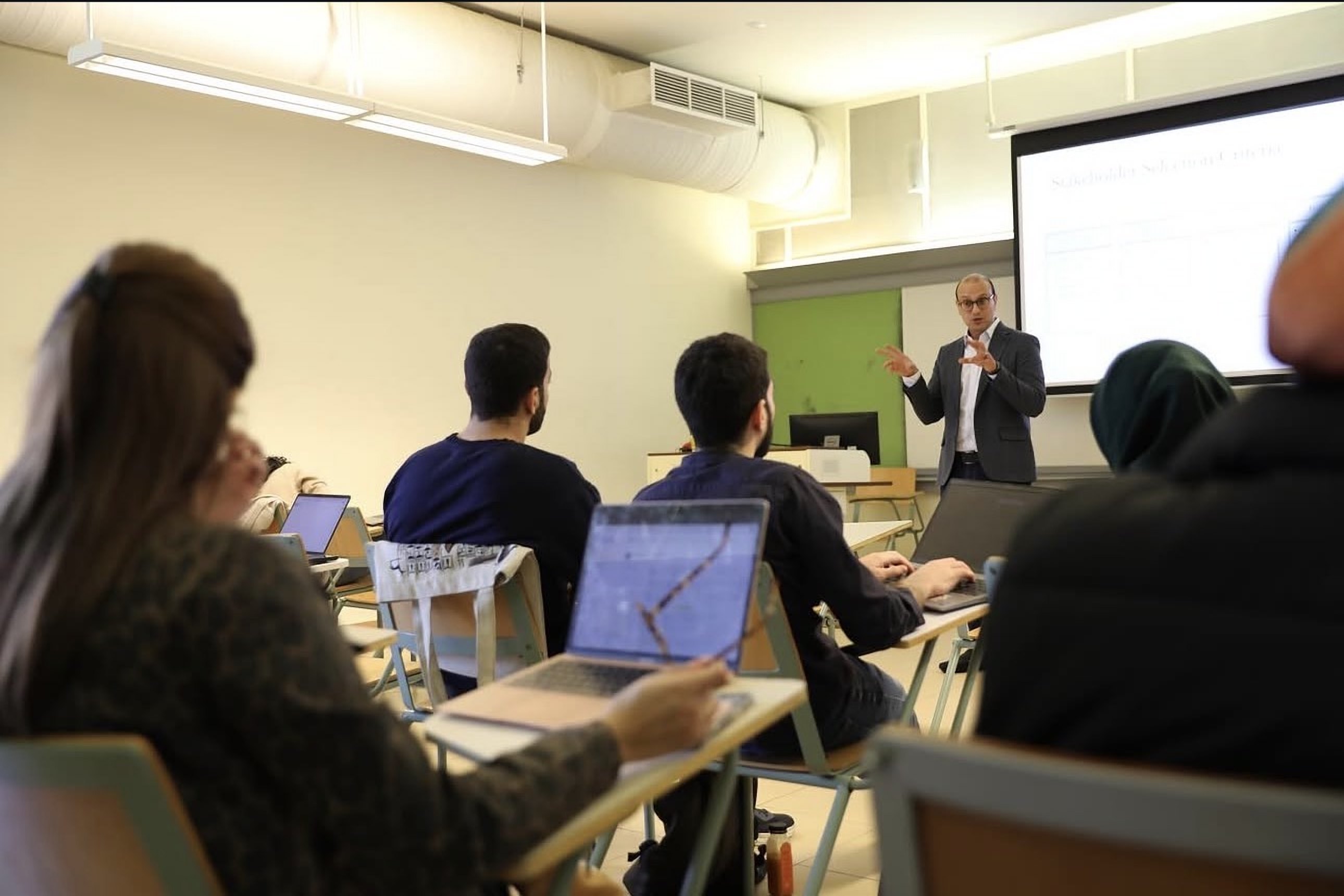 Scholars in a lecture at AUC